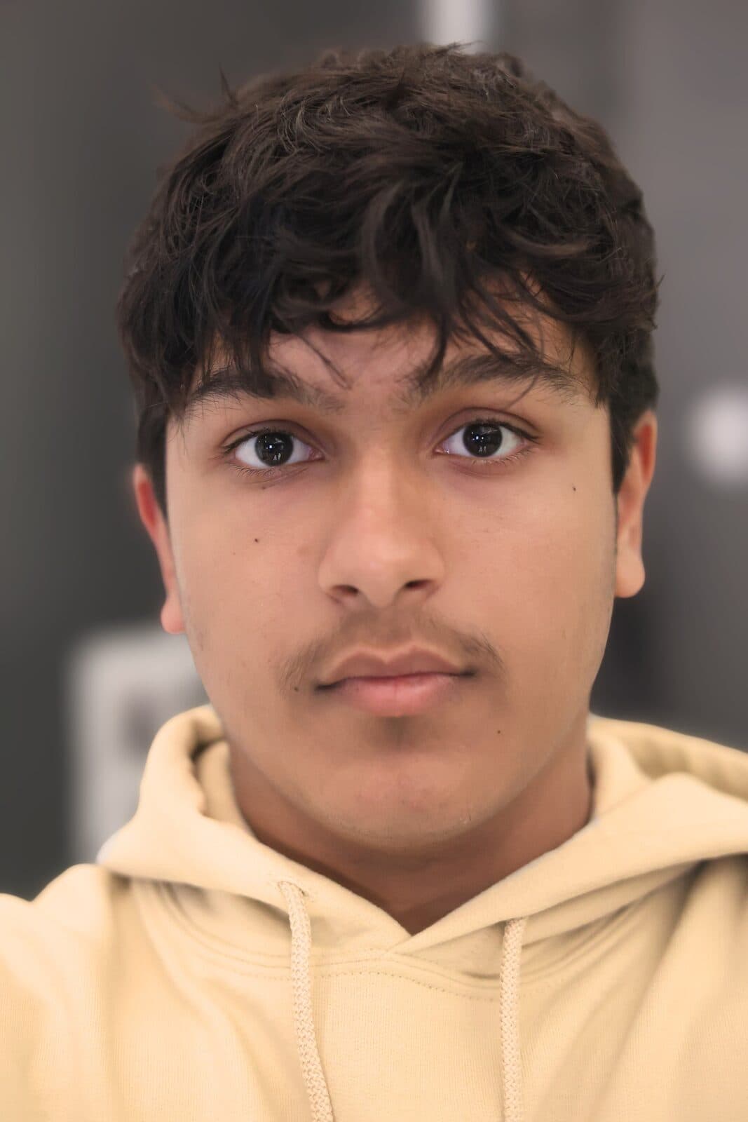 Close up portrait of Adil Mukhi