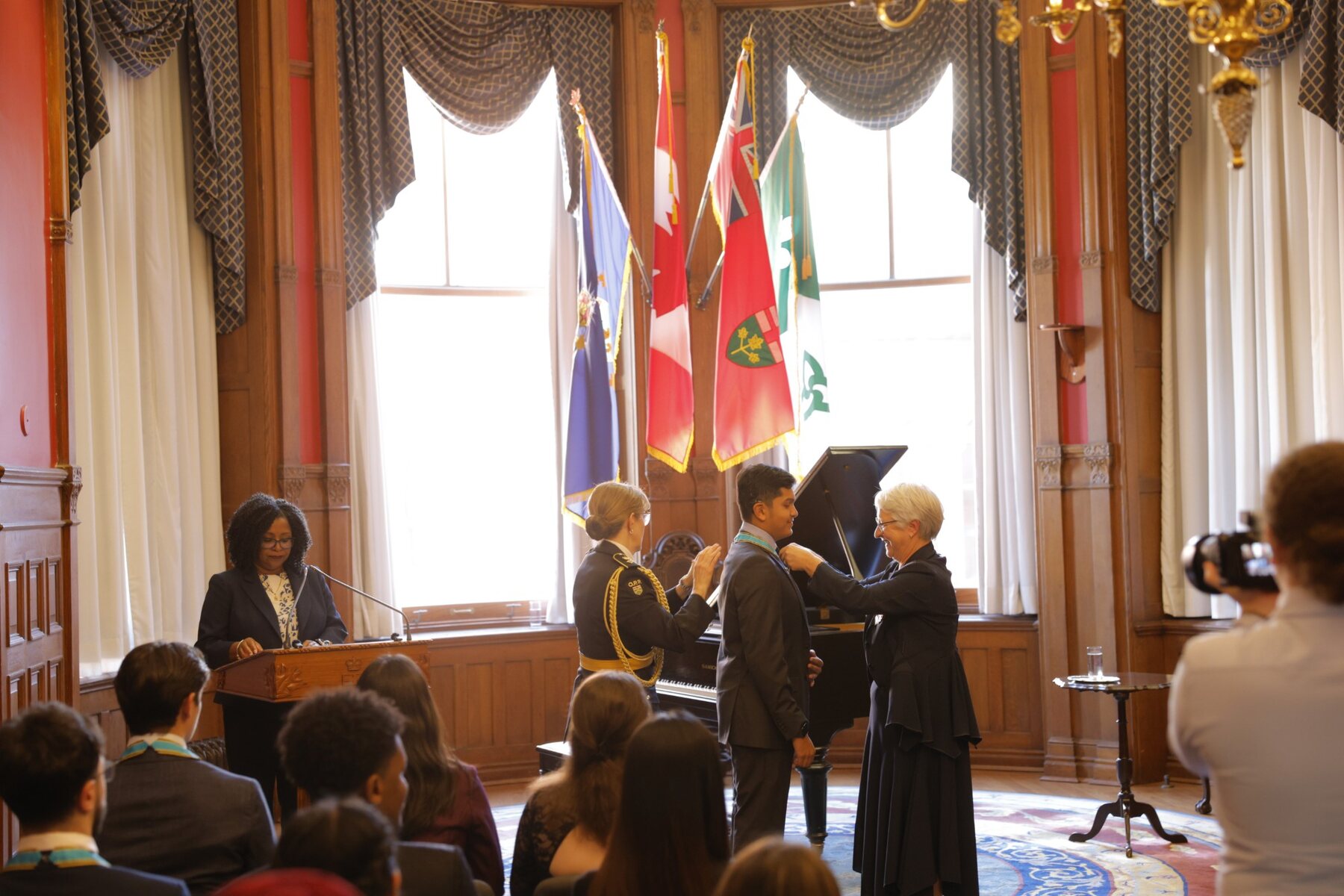 Adil Mukhi receiving the Ontario Medal for Young Volunteers at Queen's Park